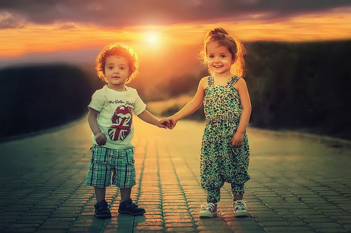 Friends - little children holding hands