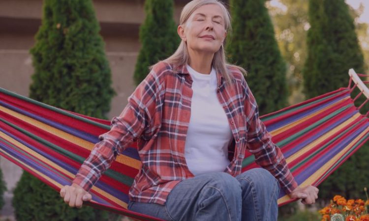 Lady looking peaceful on a hammock